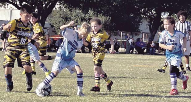 THAT’S A WRAP!— Rockdale Youth Soccer Association wrapped up its season this past weekend. An endof- year party is scheduled for 6 p.m. Saturday at the Rockdale Youth Soccer Fields. Above, Mateo Olivares and teammates play defense during Saturday’s match in Thorndale. Photo by Esme Ruelas-Olivares