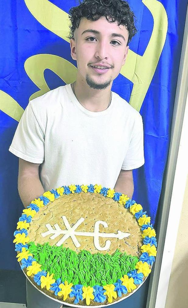 Annual Tiger cake auction a big hit Saturday