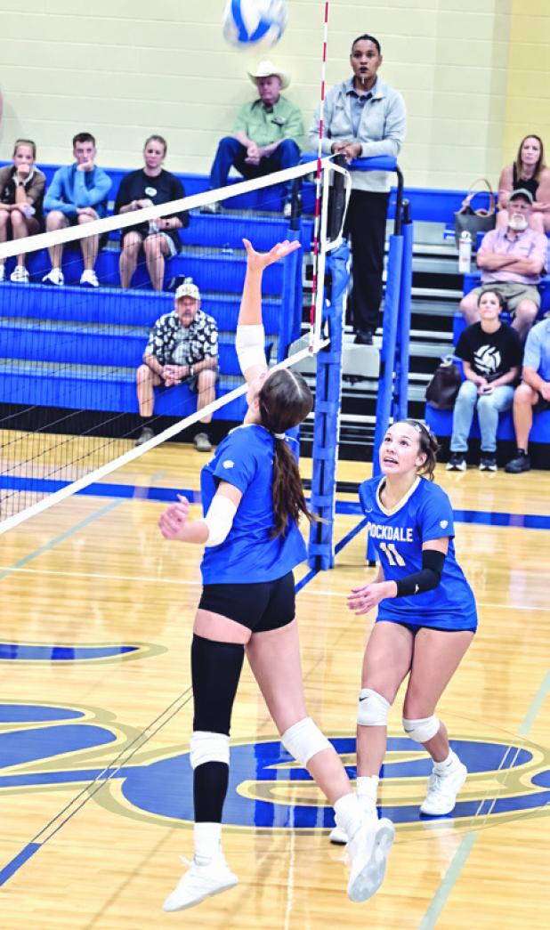 Lady Tiger Paisly Fisher (8) goes up for an attack against Caldwell as teammate MaKenzi Valdivia (11) moves into position. Photo by Brooksy Fisher