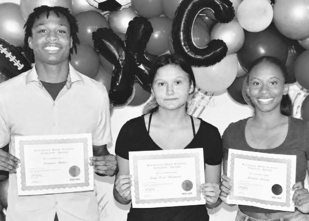 The Rockdale High School Outstanding Male Athlete of the Year was De’Andre Stephens (L), while Hannah Mckie (center) and Trinity Hurd shared the Outstanding Female Athlete of the Year award at the recent RHS Athletic Banquet. Photo by Morgan Hamrick