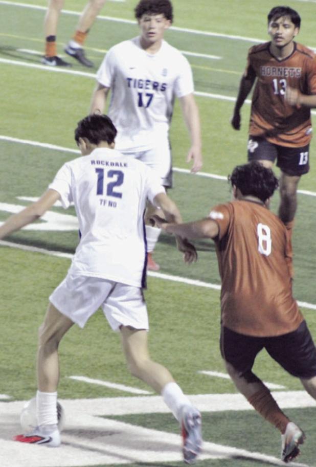 Tigers Wilmer Sorto (17) and Angel Bobadilla (12) in action versus Caldwell in the soccer district opener last week in Tiger Stadium. Rockdale Tigers Athletics photo