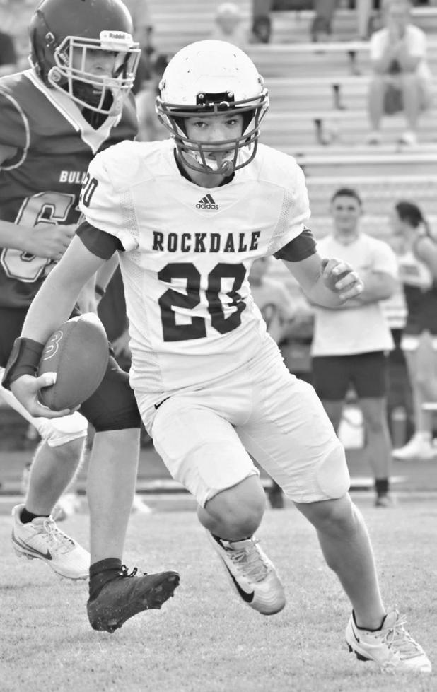 RJH running back Noah McIrvin (20) scored four touchdowns in the Tigers’ 28-16 victory over Thorndale Thursday. His TDs were runs of 45, 52, 30 and 60 yards. Photo by Ashley Zenner Willard