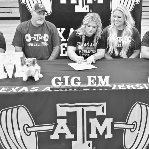 POWER SIGNING— Thorndale senior Jordyn Stutts signed with Texas A&amp;M University last week in Thorndale High School gym to continue her powerlifting career for the Aggies. Last month Stutts became a three-time state champion for the Lady Bulldogs, setting three state records in the process. Thorndale ISD Athletics photo