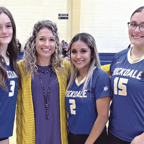 Before Tuesday night’s matches, Rockdale recognized Lady Tigers seniors Hally Simonton (3), Mariana Vargas (2) and Jayla Gonzales (15), shown here with Coach Holly Muniz. Photo submitted by Holly Muniz