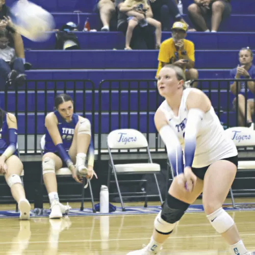 Rockdale Lady Tiger Alli Lay returns a serve on Tuesday at Tiger Gym. Reporter/Nathan Flores