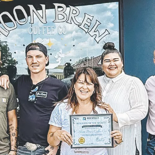 BUSINESS OF THE MONTH— Moon Brew Coffee Co. is Rockdale Chamber of Commerce’s business of the month for August. On hand for the award were (L-R) Elena Arellano, Tyler Beal, Luke Garrison, business owner Rita Gameiro, Chamber Executive Director Lucita Rodriguez, Val Gameiro, Rae Hawkins and Nicole Bivens. Moon Brew is located at 109 North Main Street. Reach the business at 512-269-5419.