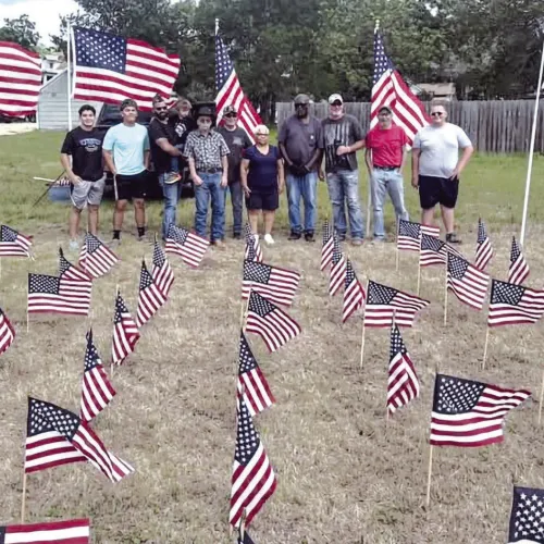 MEMORIAL DAY DISPLAY— In last week’s paper with graduation and the awards ceremony taking place a week earlier than usual, we didn’t have room for this photo of the beautiful Memorial Day Flag Display that is annually put on by the Rockdale VFW and American Legion. Shown here are members of Rockdale FFA and other volunteers making sure everything looks looked great to honor Milam County’s war dead. The Reporter hopes you were able to see it next to Rockdale Monument Co. Submitted photo