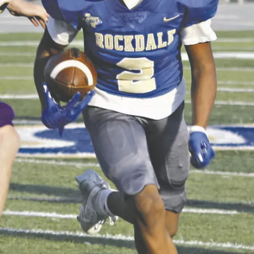King Knox of the Rockdale JV Tigers looks down field for the end zone on Thursday against the Granger Lions JV. Knox had two touchdowns— one rushing and one receiving. Reporter/ Nathan Flores