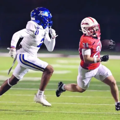 Tiger DB King Knox (2) runs down a Leopard running back in Friday night’s game. Photo by Rod Aydelotte
