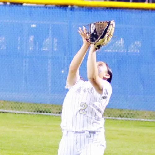Lady Tiger Janaya De La Garza catches a fly ball against the Rogers Lady Eagles last week at Tiger Field. Reporter/Nathan Flores