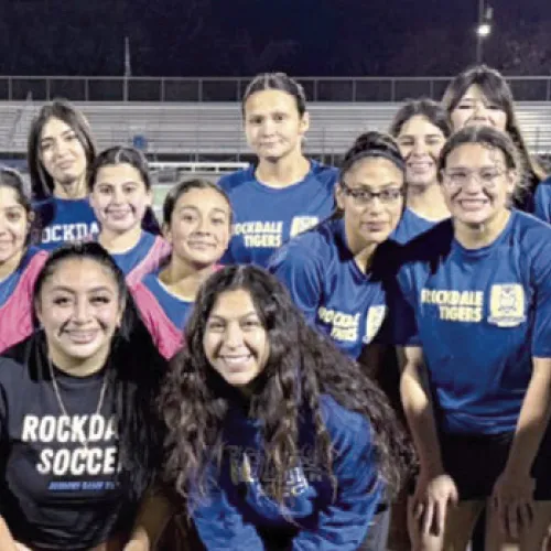 The Rockdale Lady Tigers soccer team (above) went 2-2 last week in their third annual Lady Tiger Blue &amp; Gold Cup Invitational tournament, while the Tigers soccer team (below) defeated the Madisonville Mustangs, 4-1. Rockdale Tigers Athletics photos