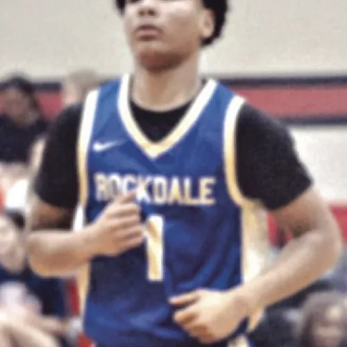 Rockdale Tiger Jeremiah Watts (1) heads down court during the Hays Tournament in Buda last week. Watts helped contribute to the Tiger offense. Rockdale Tigers Athletics photo