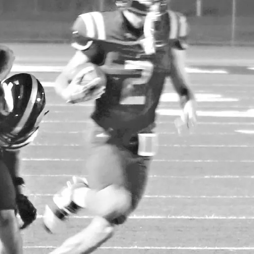 Tiger receiver Alex Cooper scores on a 19-yard pass from QB Greyson Williams against Giddings. Cooper had eight catches for 81 yards against the Buffaloes Friday night at Tiger Stadium. Reporter/Nathan Flores