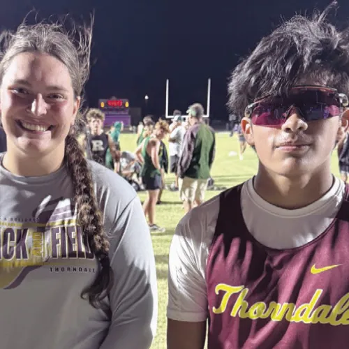 Two weeks ago at the Donald Beard Relays in Thorndale, Lady Dog Bethany Preusse (L) set a new school record in the shot put with a throw of 46’-1/2”. Last week at the Thrall Tiger Relays, Bulldog Jamie Llanas (R) set a new school record in the 1600M run with a time of 4:47.09. Thorndale ISD Athletics photo