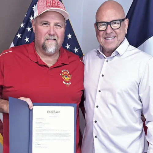 Trent Wages was celebrated by Mayor Ward Roddam and the city council for his 30 years of service to the Rockdale Volunteer Fire Department upon his retirement.