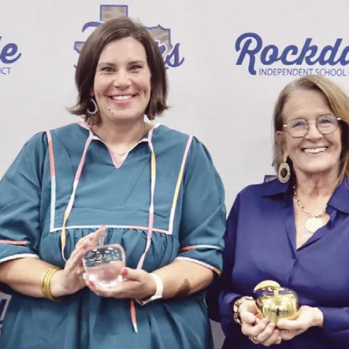 One teacher at each RISD campus was awarded a Teacher of the Year Golden Apple at the annual recognition banquet last Tuesday. Shown here are Taylor Grayson from Rockdale Intermediate School, Lauren Williams with Rockdale Elementary School, Lisa Debault from Rockdale High School and Lisa Laneer from Rockdale Junior High.