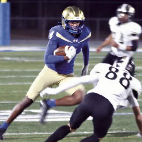 Left, Rockdale senior wide receiver Kendrick Henderson (4) eludes McGregor defenders during the Tigers’ 49-26 homecoming victory Friday night at Tiger Stadium. Henderson caught seven passes for 90 yards and a touchdown. Center, senior running back Jeremiah Butler (1) powered the ground game with 272 yards and two Reporter photos above and far right by Nathan Flores