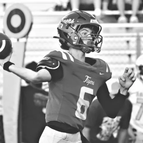 Quarterback Hayze Hamrick threw a touchdown pass in the win over Academy to keep the JV Tigers undefeated. Photo by Ashley Zenner Willard