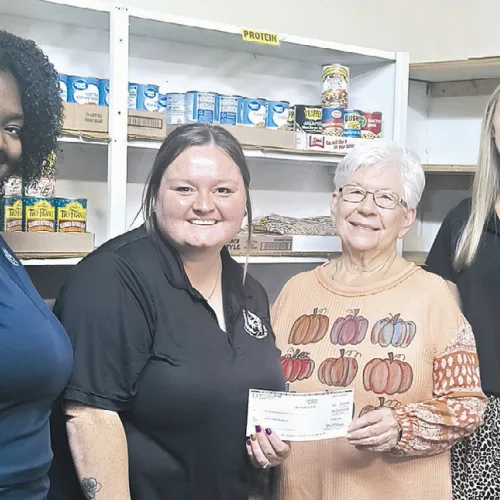 DONATION— Rockdale Federal Credit Union made holiday donations to both the Rockdale Christian Services food pantry and Rockdale Senior Center last week. Shown here at the food pantry are RFCU employees Nygia Crawford, Samantha Wilson, food pantry treasurer Joyce Kirk and Lyndsey Kolar.