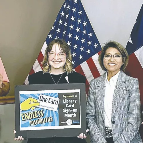 Mayor Ward Roddam proclaimed September as Library Card Sign-up Month at Monday’s council meeting. Shown here (L-R) are Roddam, Olicia Schuch, Library Director Lisa Riggs and Eliabeth Kelley.