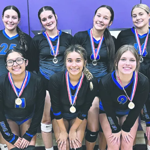 The Lady Tigers JV (above) and freshman (below) claimed second and third place, respectively, in last week’s Holland Tournament.