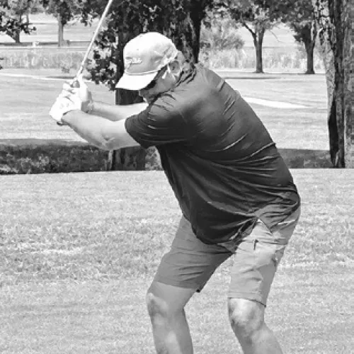 Rockdale Tiger Booster Club President tees off on hole 6 at the Rockdale Country Club during the annual booster club tournament. Reporter/Nathan Flores