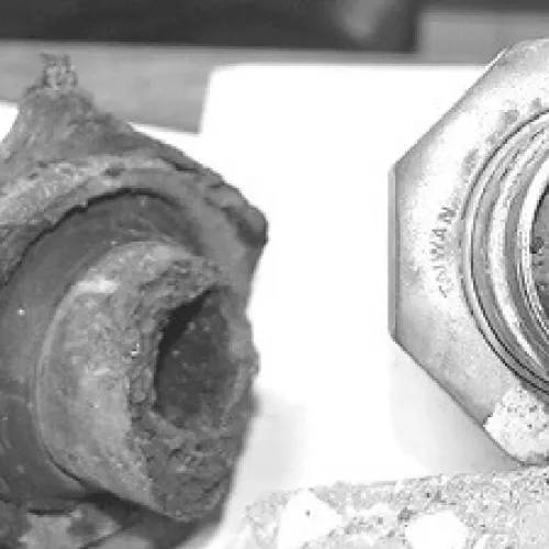 Cast iron water pipes excavated in 2016 shows mineral buildup. — File photo