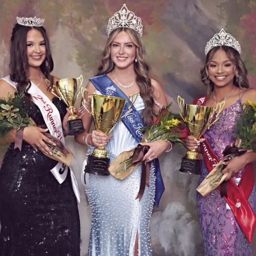 FAIR ROYALTY— Addisyn Lunsford, center, was crowned Miss Rockdale Fair Queen on Saturday night at the annual pageant held in the RHS auditorium. She is sponsored by Whiteley’s Farm Supply. First runner-up is Jazzlynn Dixon (R) sponsored by Caffey Corner, and second runner-up (L) is Becca Thomas sponsored by M&amp;G Designs Boutique. See the children’s pageant winners on page 6A. Photo courtesy of Jocelyn Lewis at Rockdale Signs &amp; Photography