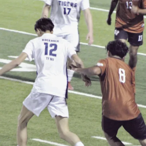 Tigers Wilmer Sorto (17) and Angel Bobadilla (12) in action versus Caldwell in the soccer district opener last week in Tiger Stadium. Rockdale Tigers Athletics photo