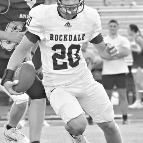 RJH running back Noah McIrvin (20) scored four touchdowns in the Tigers’ 28-16 victory over Thorndale Thursday. His TDs were runs of 45, 52, 30 and 60 yards. Photo by Ashley Zenner Willard